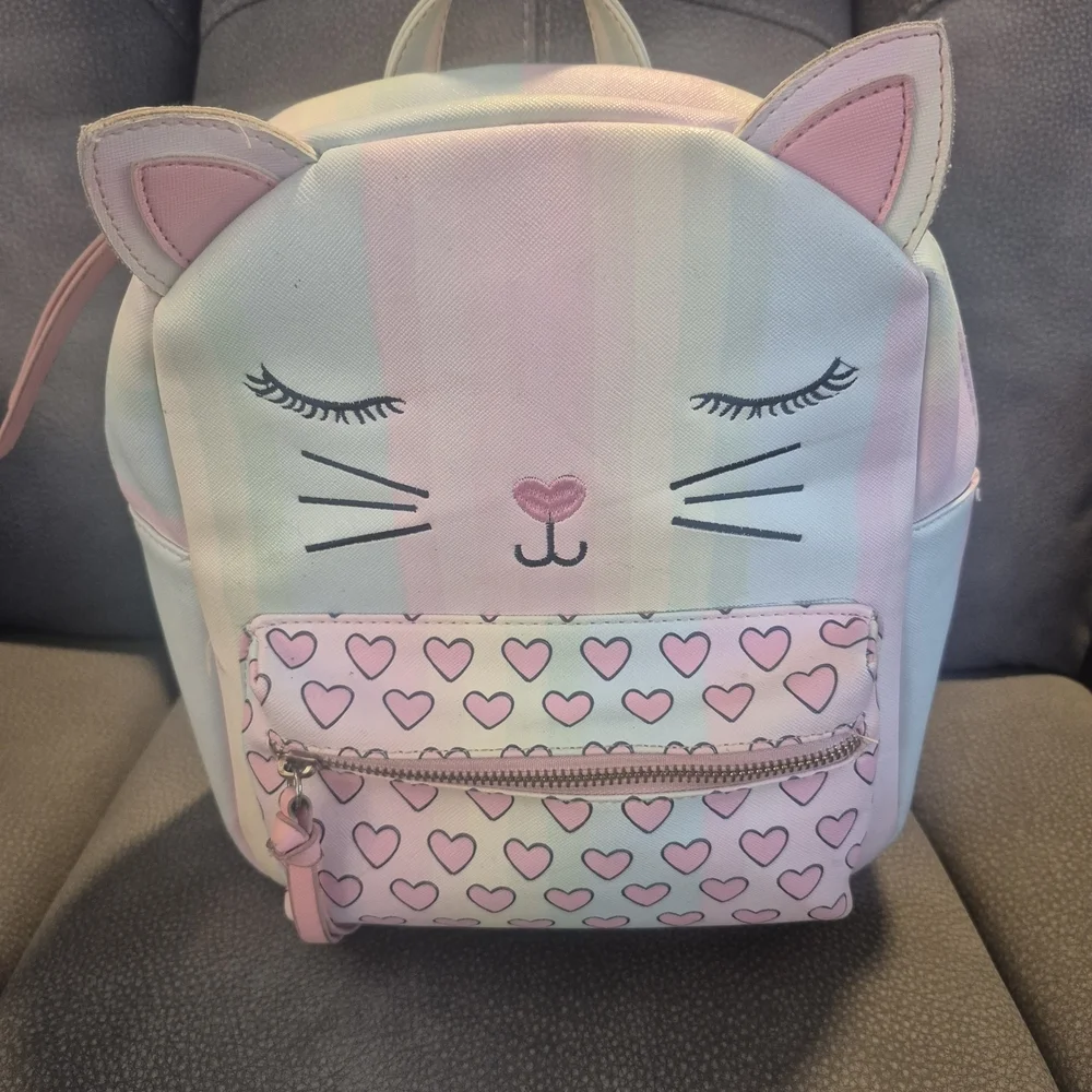 SHEILA by Underonesky.  Pastel Kitty Face Backpack
